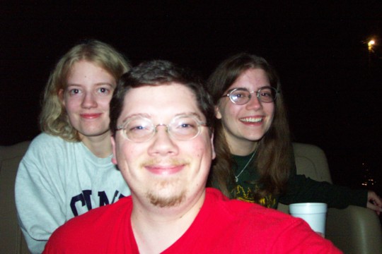 Beth, Josh, and Kaly star-gazing and Weird-Al-listening on the dock at Camp Okoboji