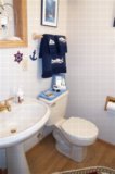 Upstairs half bath off kitchen/dining