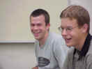 Kyle and Geoff laughing during a quiz.